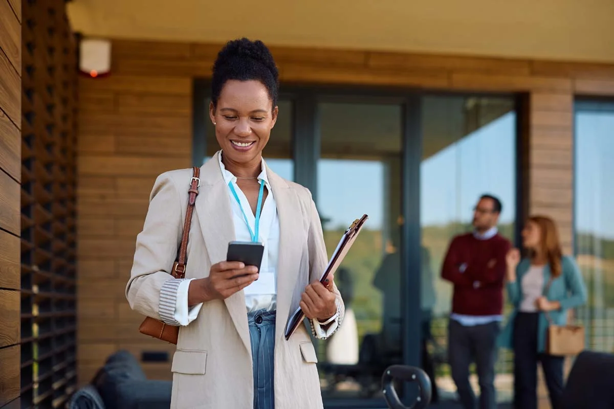 A self-managing Airbnb host using digital management tools to organize their rental business