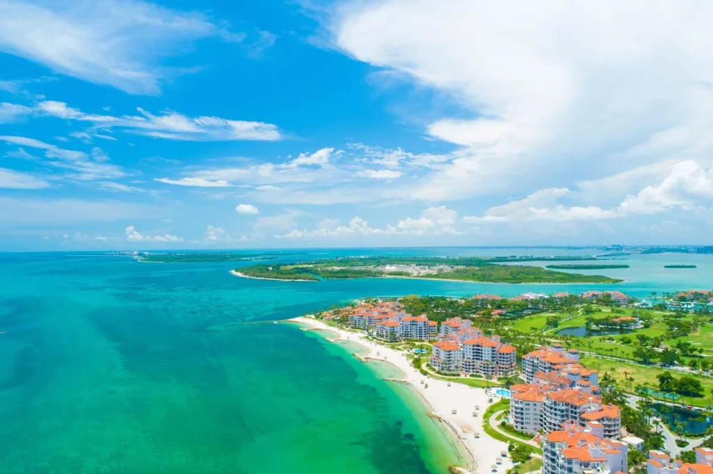 Aerial view of the Miami Beach shoreline and luxury vacation rental buildings