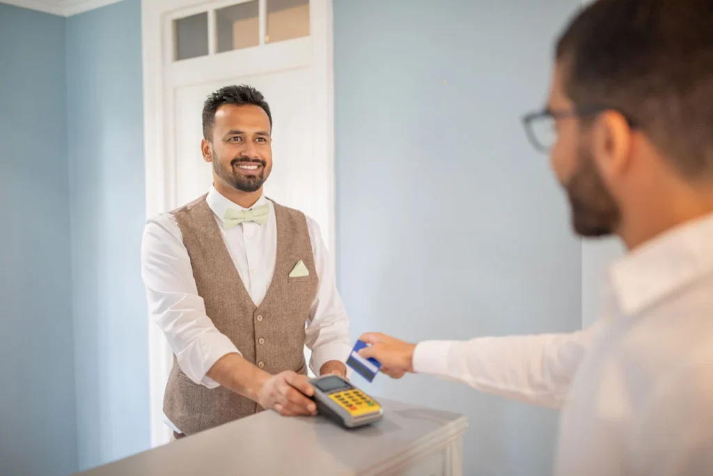 Hotel staff greeting guests warmly