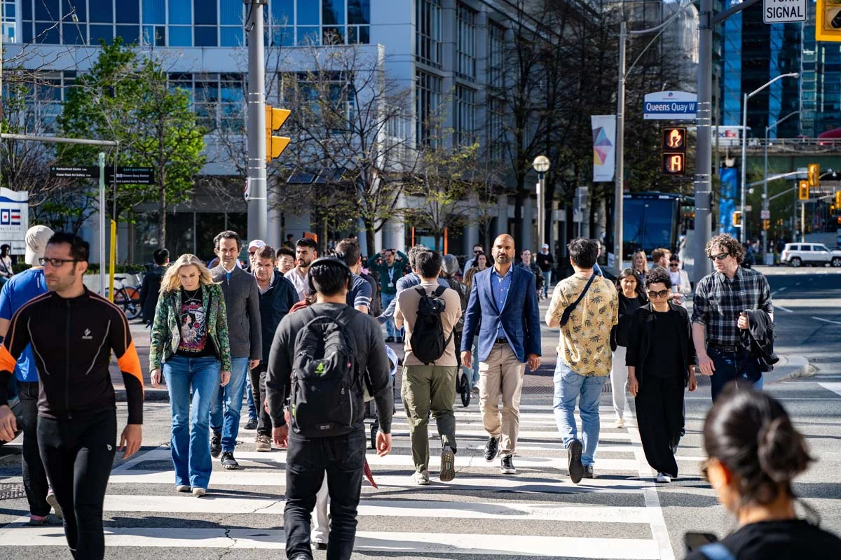 A busy street in the Downtown Toronto near popular Airbnb locations