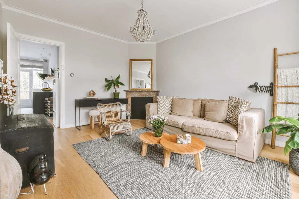 A modern and well-decorated living room in a high-quality short term rental property