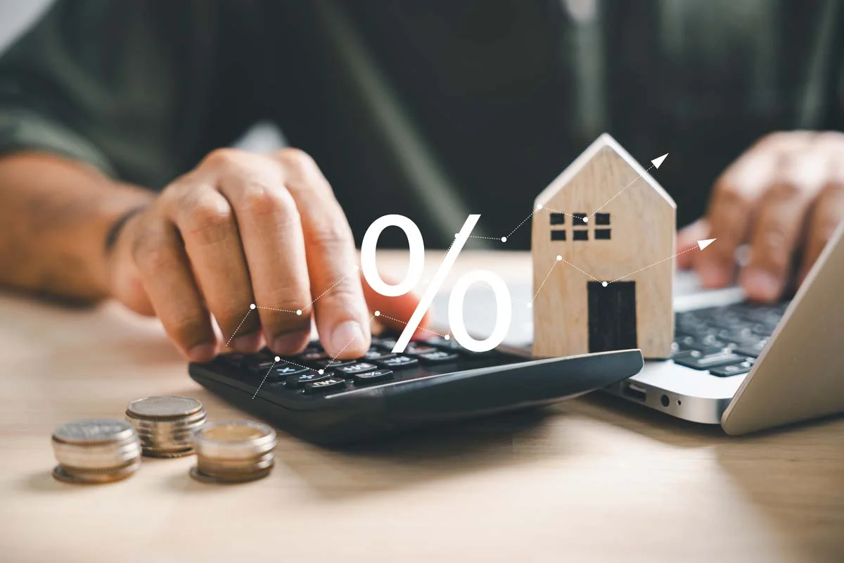 A property owner calculating taxes and managing finances for a short term rental property