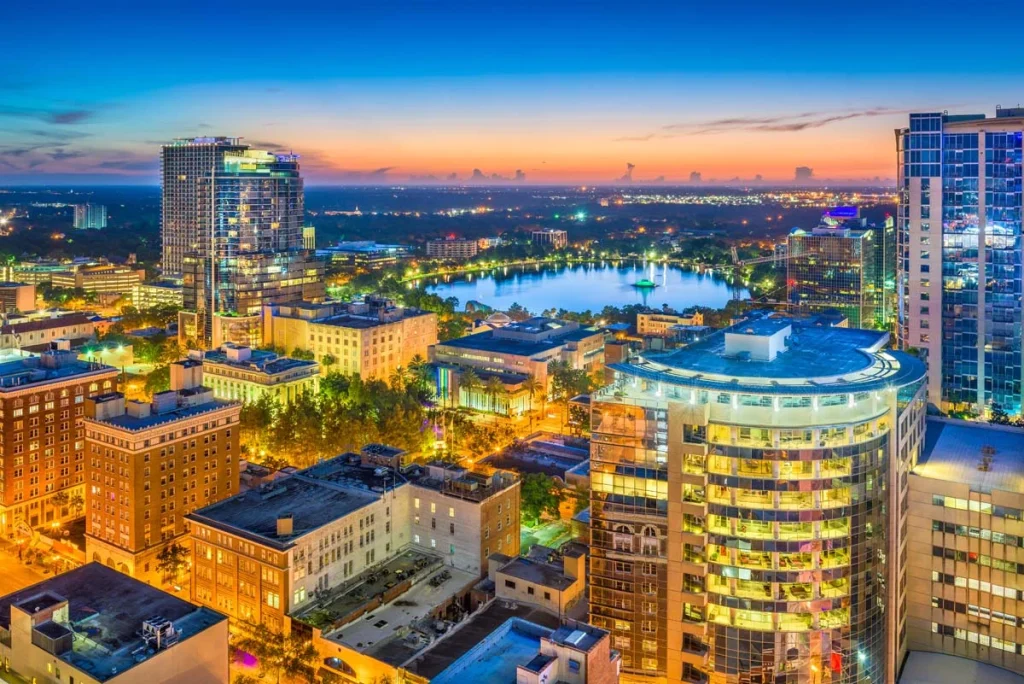 Aerial cityscape towards Lake Eola in Orlando, Florida, at dusk