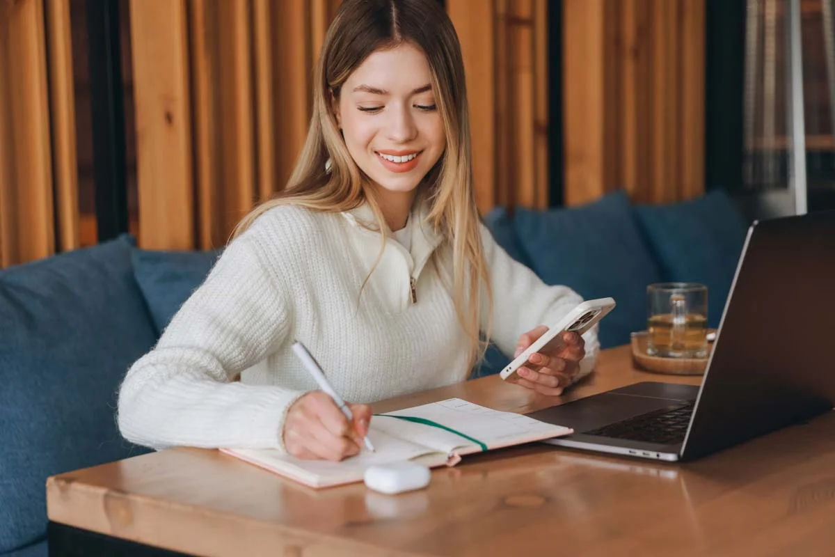 An Airbnb host using a laptop to complete the online Toronto short term rental registration process