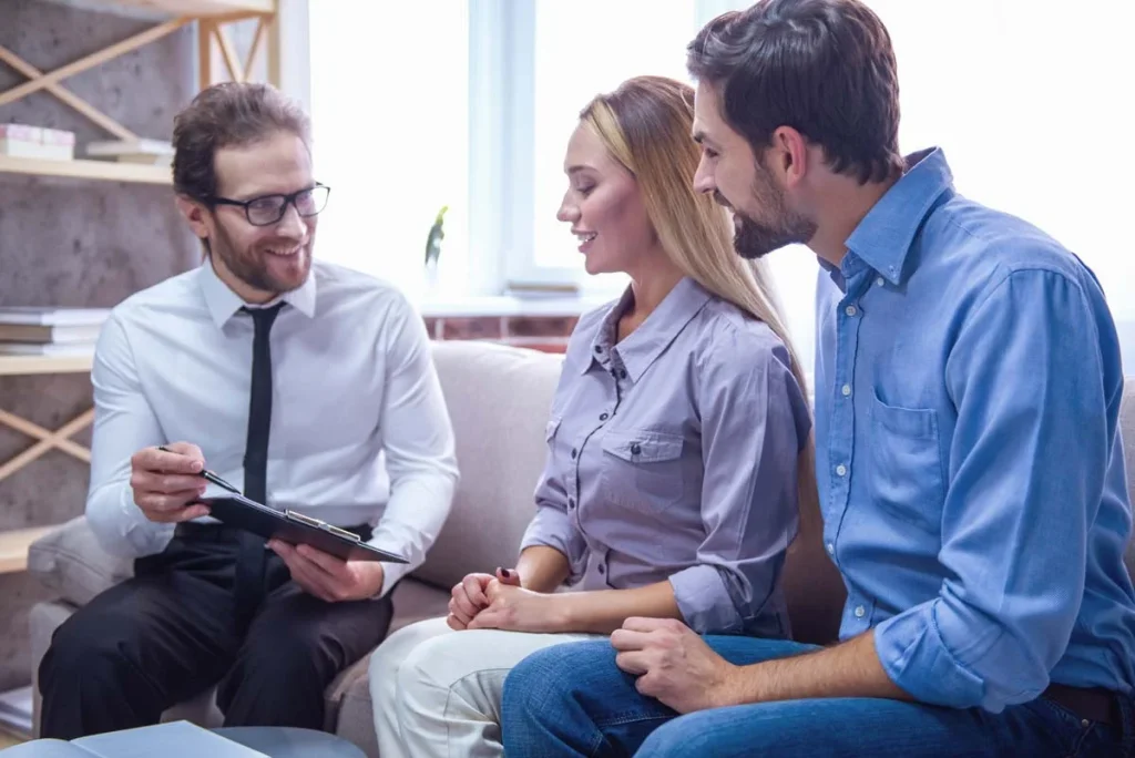 Homeowners discussing with an Airbnb property manager in Richmond Hill