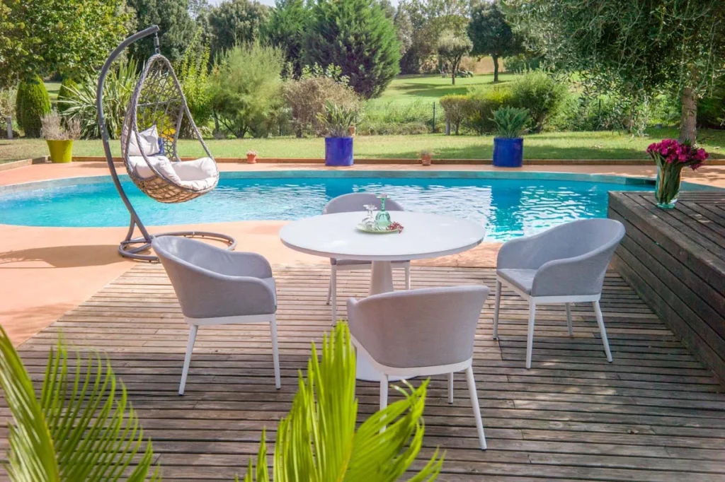 Luxury backyard pool and patio area at a vacation rental home