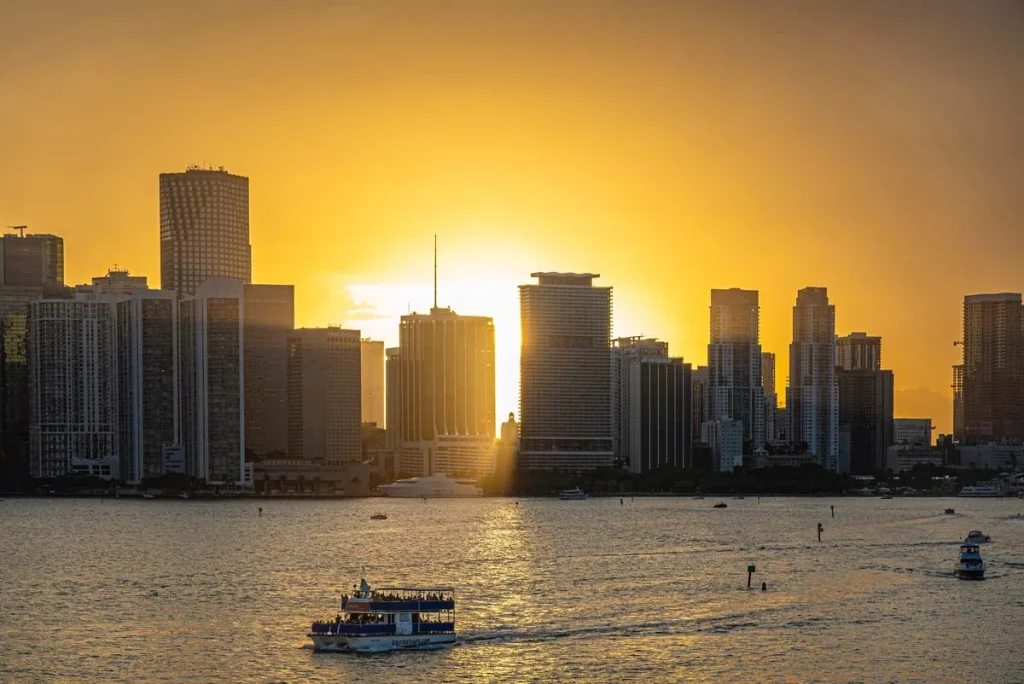 Miami skyline at sunset, representing the busy market for short term rentals in Miami and showing high-end vacation properties