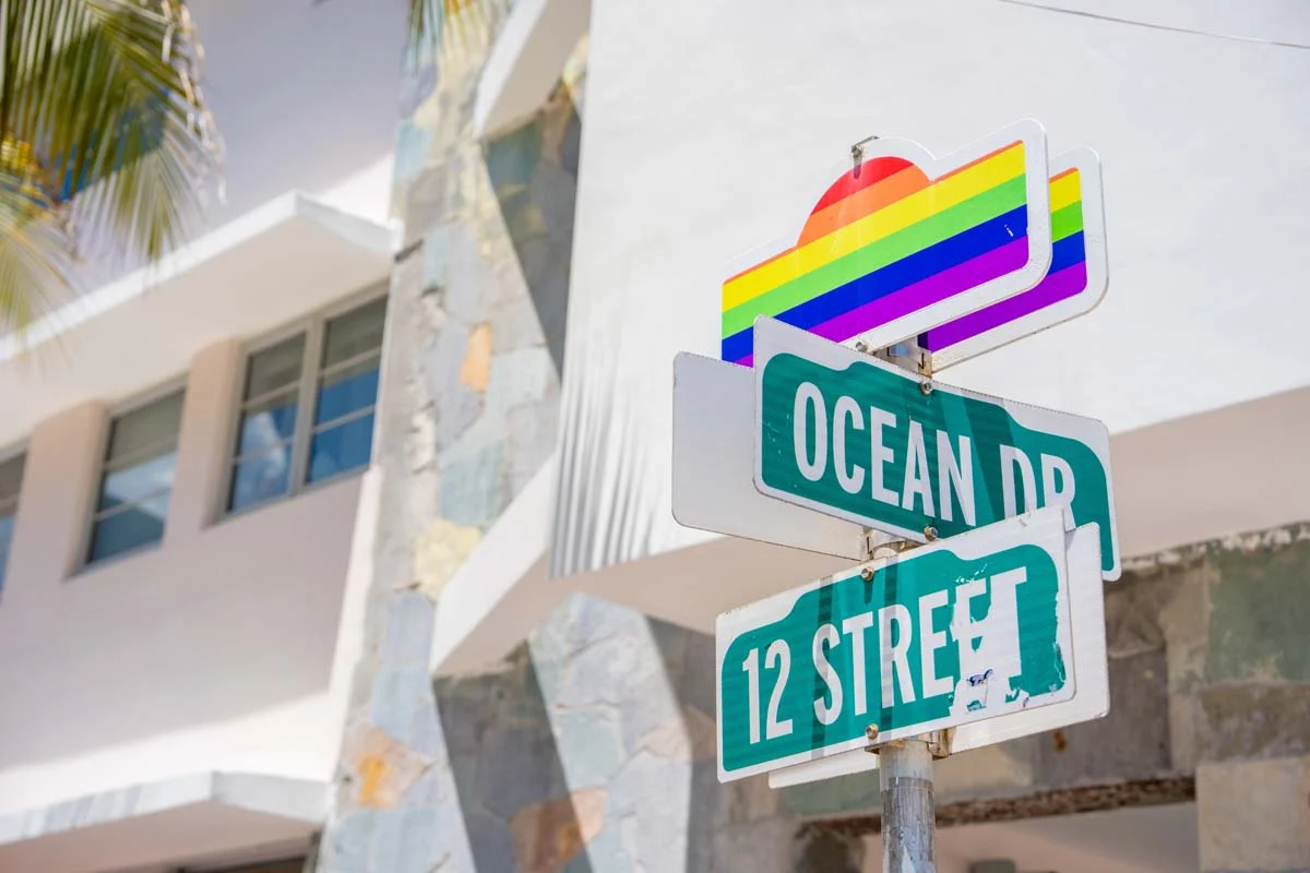 Overhead view of Miami Beach street sign, illustrating different zones for short term rental Miami regulations