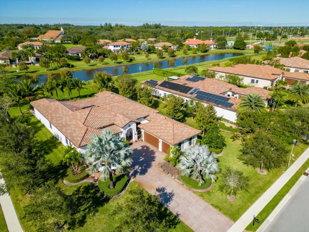 The exterior of beautiful luxury mansions in DavieFlorida under blue skies