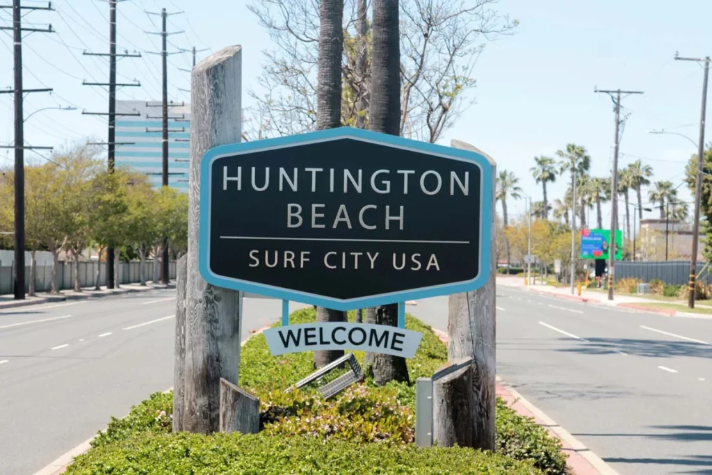 Welcome sign on the border entering Huntington Beach. Huntington Beach is known for Surfing and Great Beaches. Surf City, USA