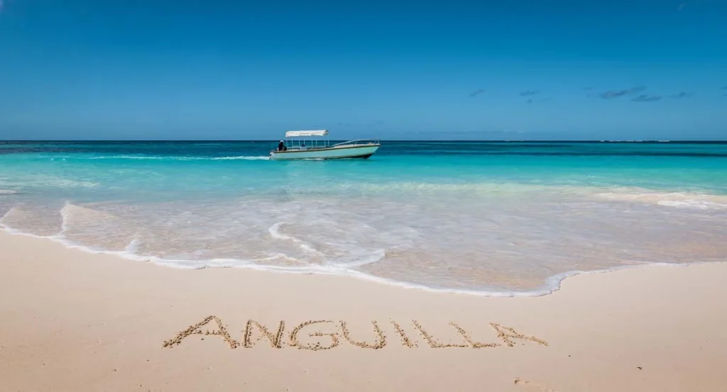 A beautiful coastal view of a famous bay in Anguilla featuring vibrant blue Caribbean waters