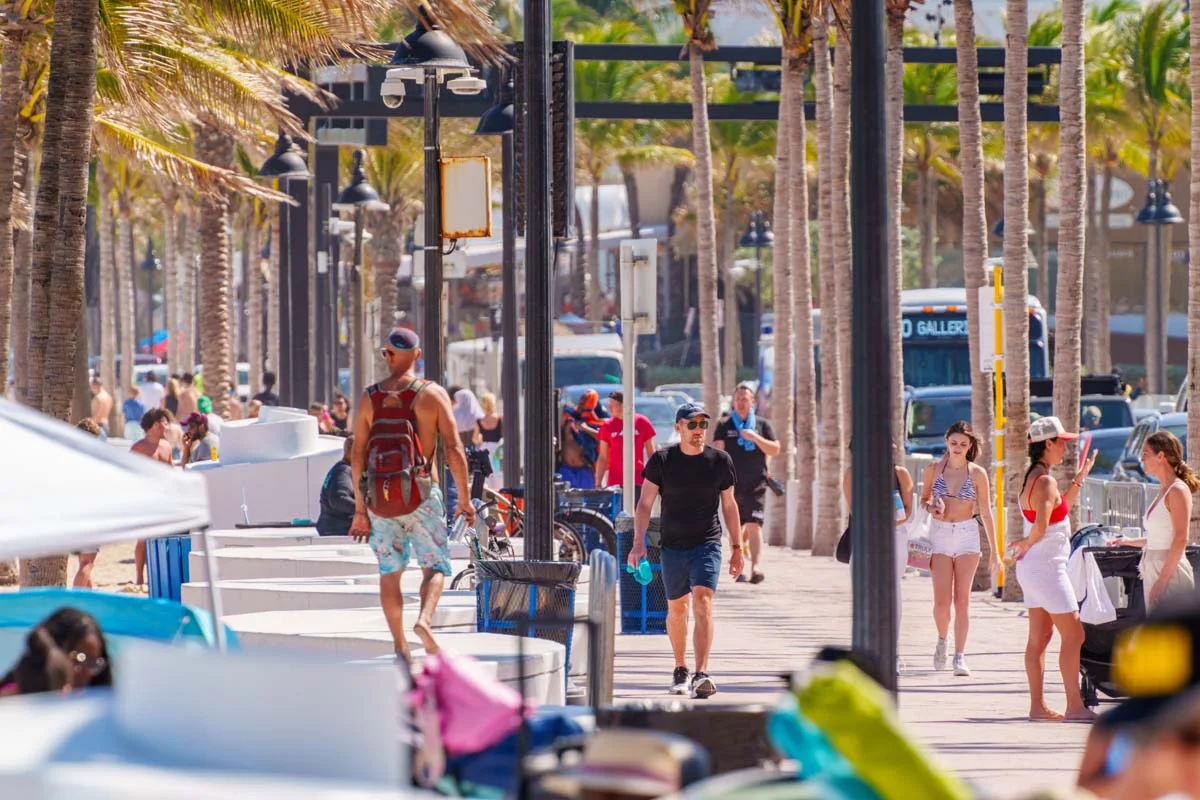 A busy, sunny day on Fort Lauderdale beach during peak winter tourist season