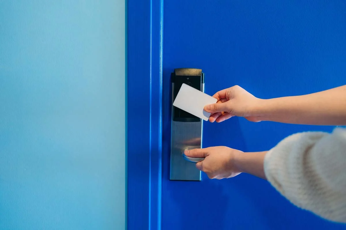 A modern front door of a vacation rental with a digital smart lock for guest check-in