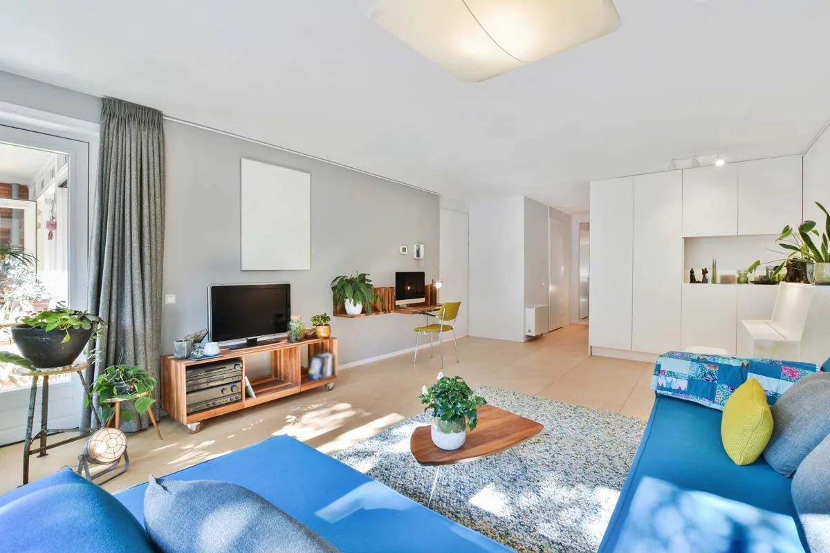 A professionally cleaned and styled modern living room ready for vacation rental guests