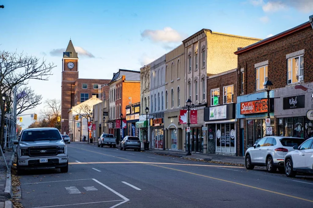 A street view of Downtown Brampton featuring well-kept brick buildings
