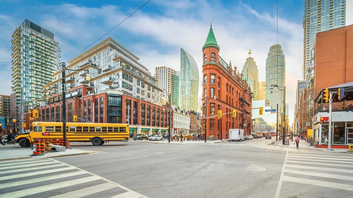 A vibrant street view of Downtown Toronto, an ideal area for short-term rental property management