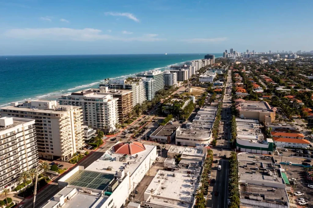 Aerial photo of Surfside showing vacation condos and rental properties overlooking the ocean