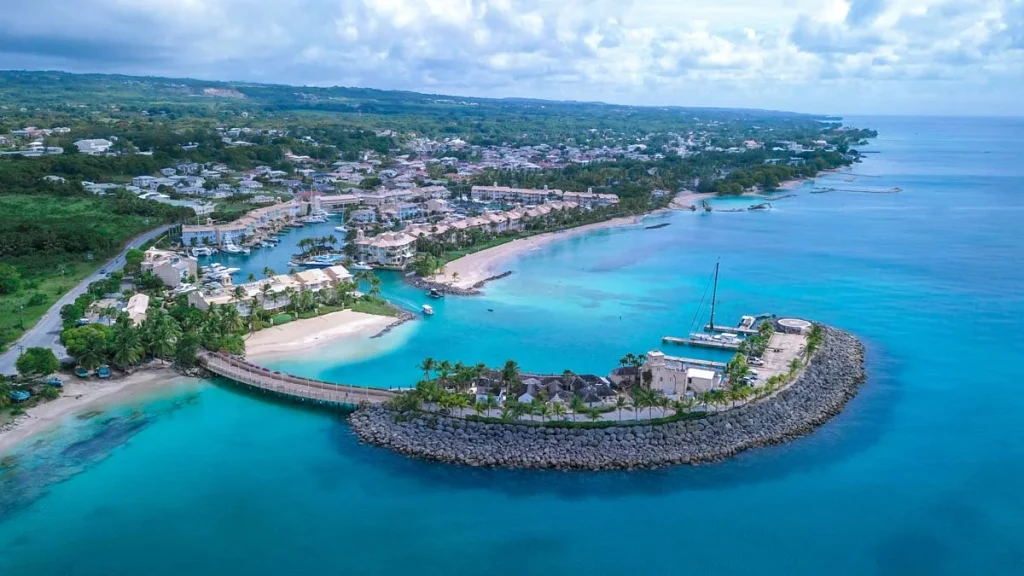 Aerial view of luxury vacation rental villas in Barbados featuring tropical landscaping and turquoise ocean