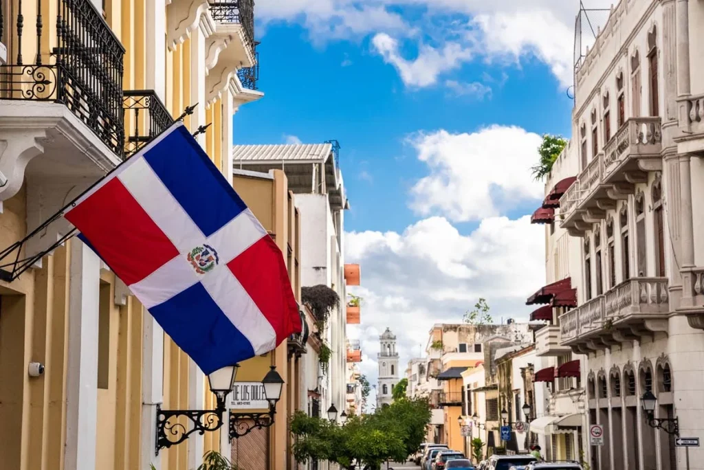Flag of the Dominican Republic on the wall of a building in the colonial zone