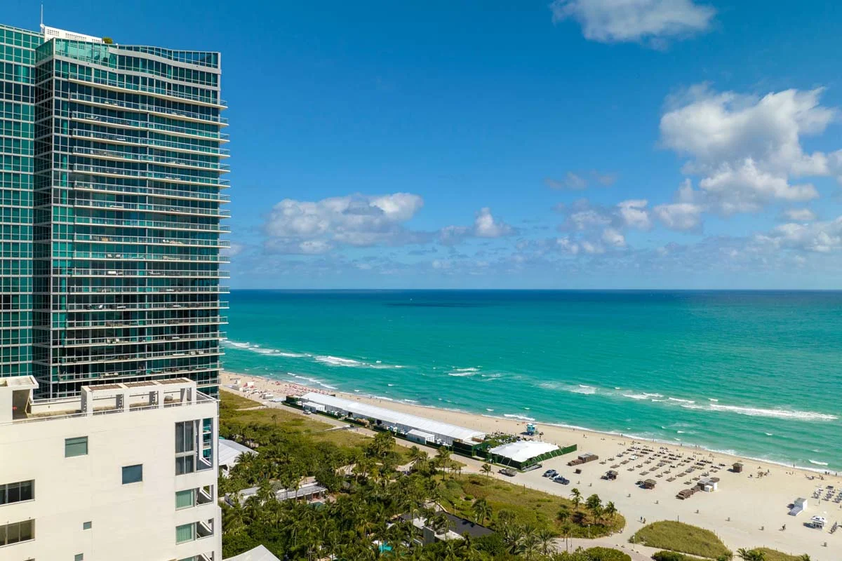 Luxury condo building in South Florida representing vacation rental property management opportunities