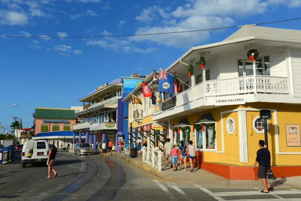 People strolling along the shops in downtown George Town, Cayman Islands, enjoying the tropical atmosphere