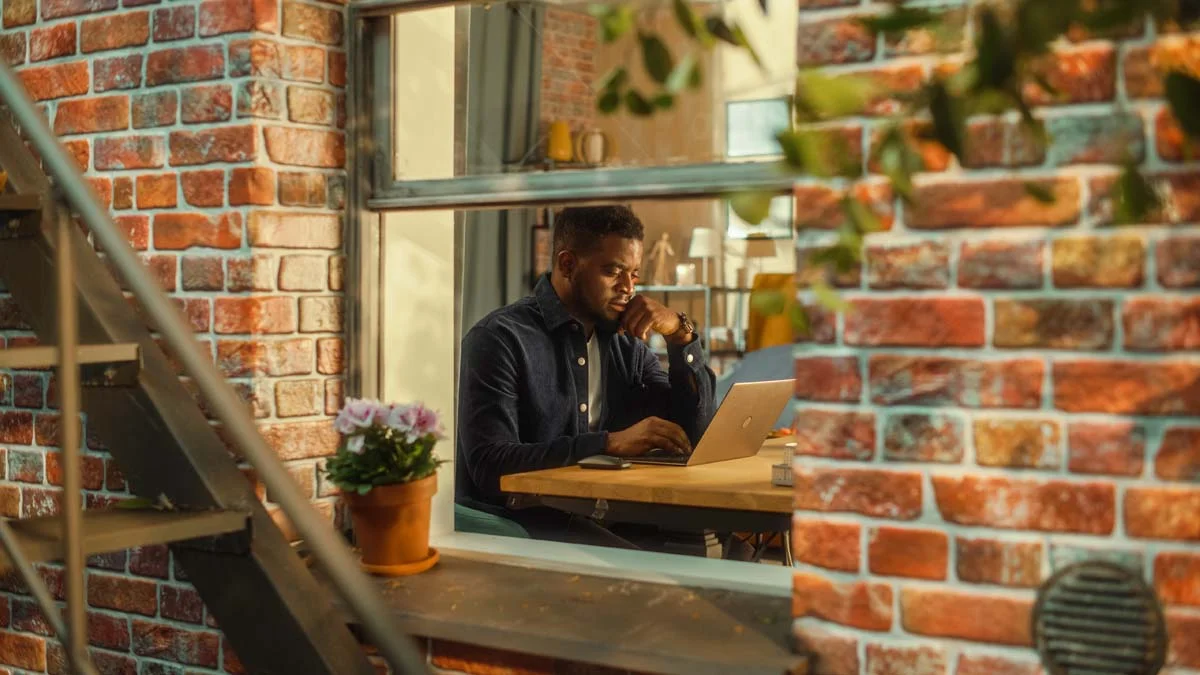 A digital nomad staying at a furnished apartment in Brooklyn, a growing trend for short term and mid-term stays