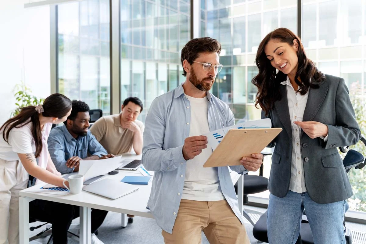 A professional Airbnb property management expert from Guestable helping a host with their short-term rental permit