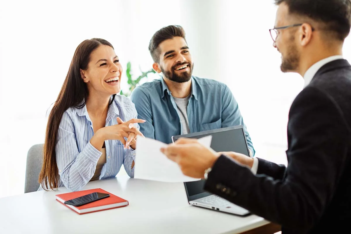 A professional property manager discussing their rental strategy with property owners