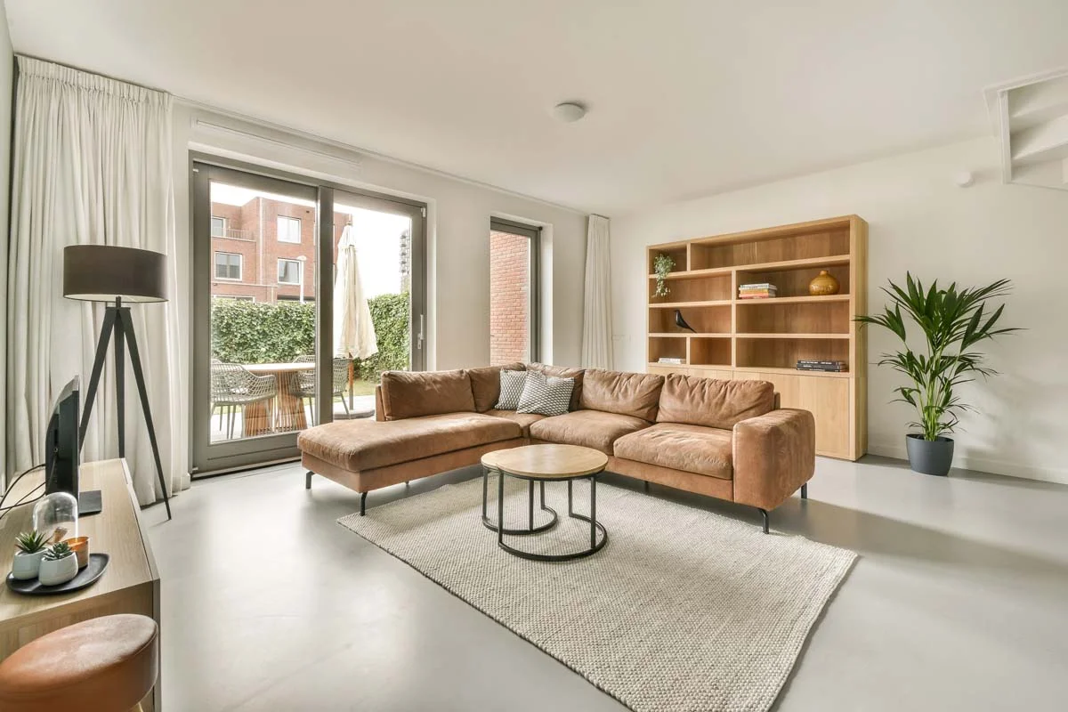 A professionally styled modern living room in a luxury short-term rental