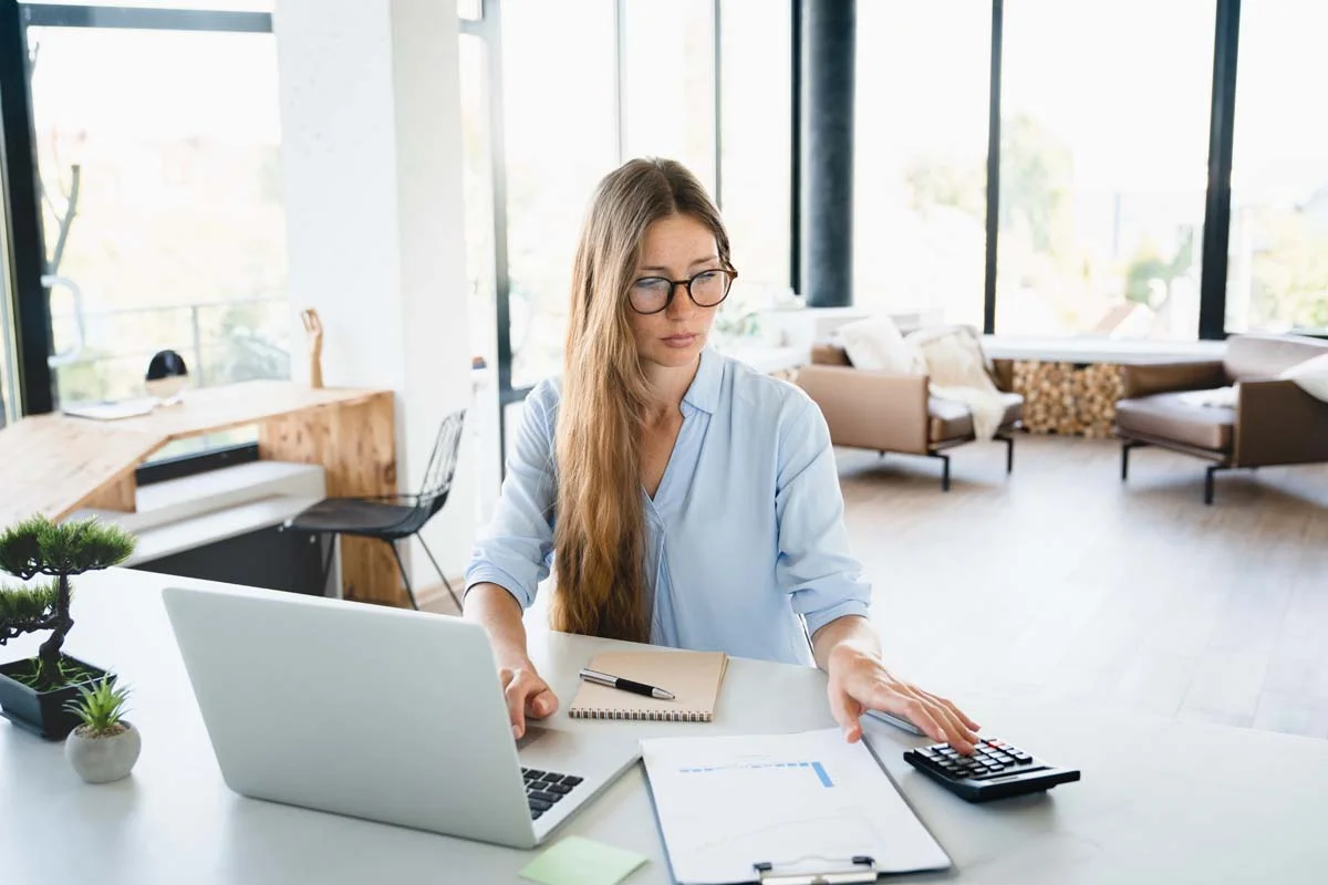 A property owner reviewing short term rental property management rules and local licensing requirements