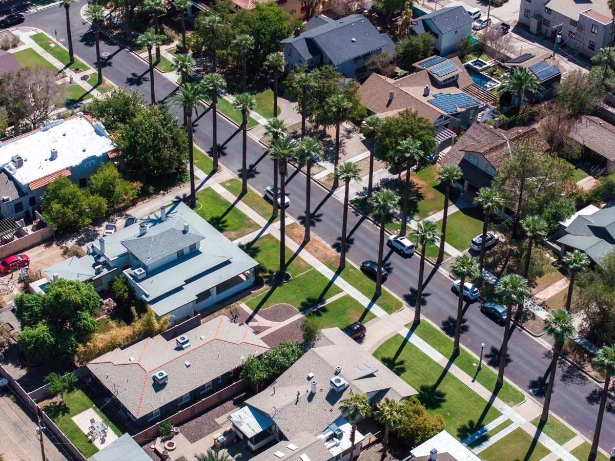 A sunny residential neighborhood with palm trees in the Valley of the Sun, Phoenix