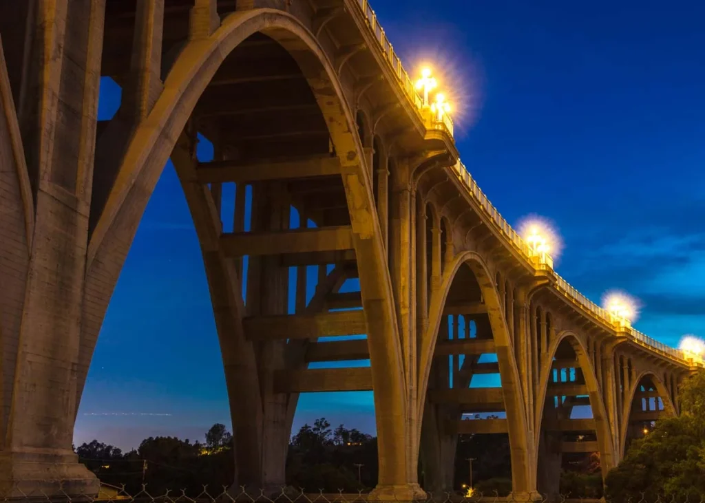 Historic Colorado Bridge Arches at dusk, one of the most scenic and stunning attractions that short term rental guests in Pasadena love