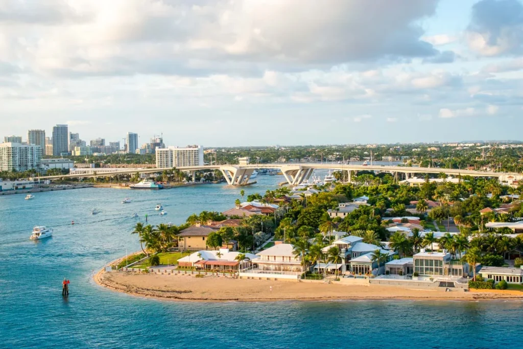 Lively daytime view of Fort Lauderdale landscape with small beach and bridge at Port Everglades