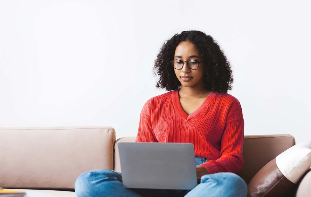 A New York host using a laptop to manage their registration with the Office of Special Enforcement