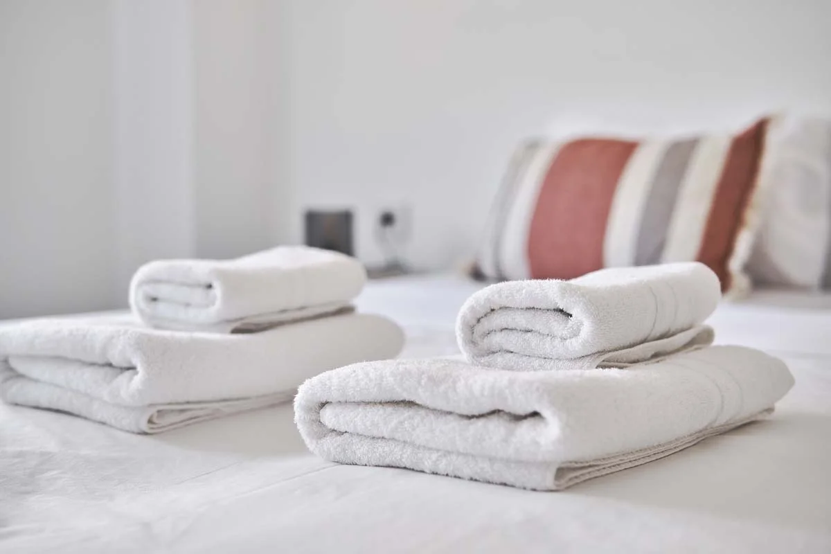 A clean and cozy bedroom prepared for guests in a homesharing property