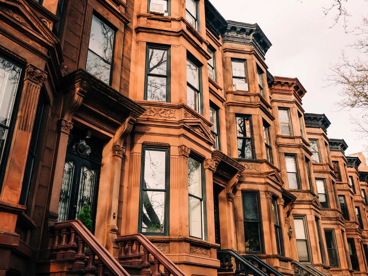 Row of classic brick brownstone houses in Park Slope, Brooklyn, NY