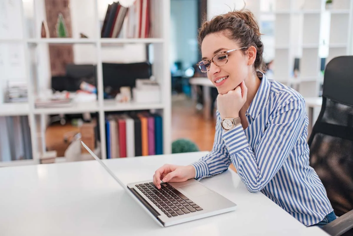 A homeowner at a desk preparing a digital application for short term rentals in London