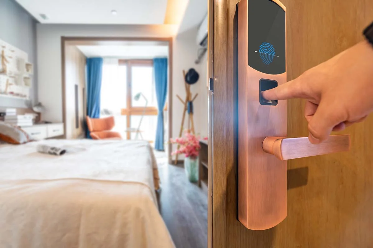 A modern electronic smart lock installed on a residential front door