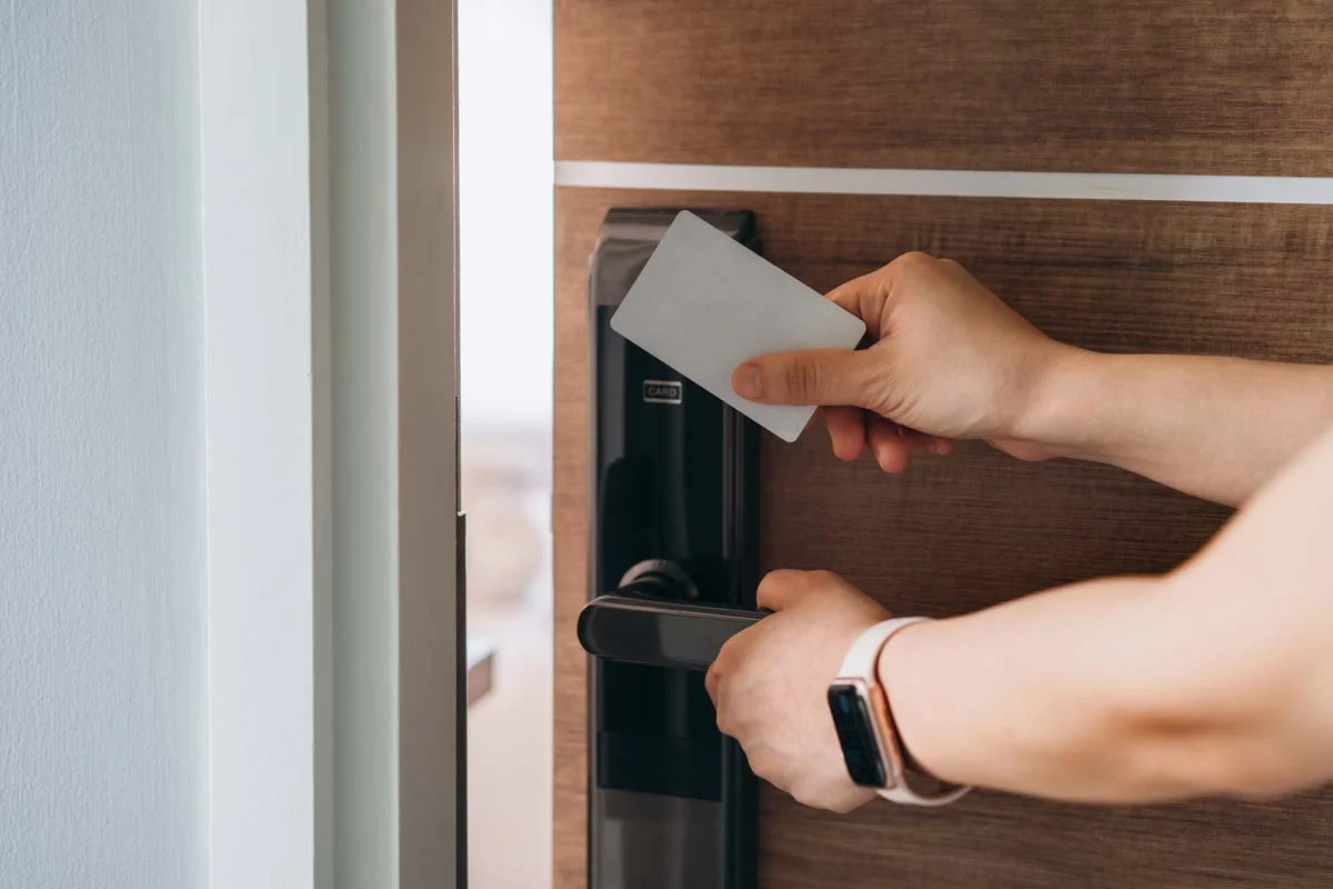 Guest using a digital smart lock for a seamless check-in at a vacation rental property