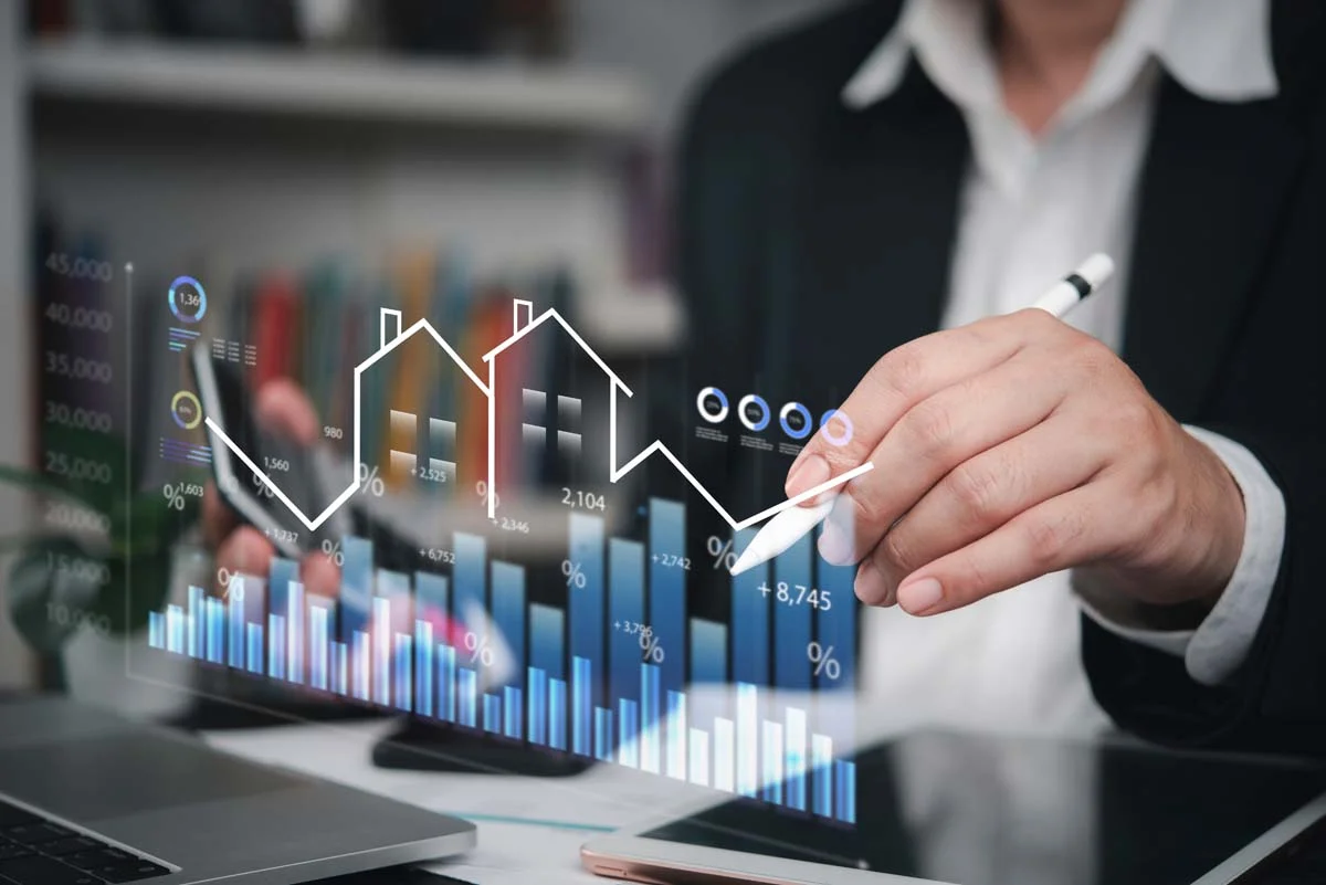 Investor reviewing rental market data on a laptop