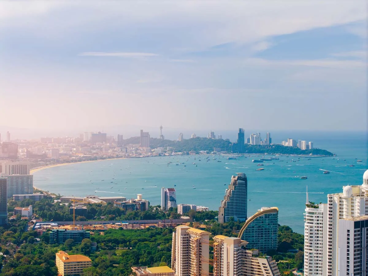 Wide skyline view of a popular tourist city near a beach