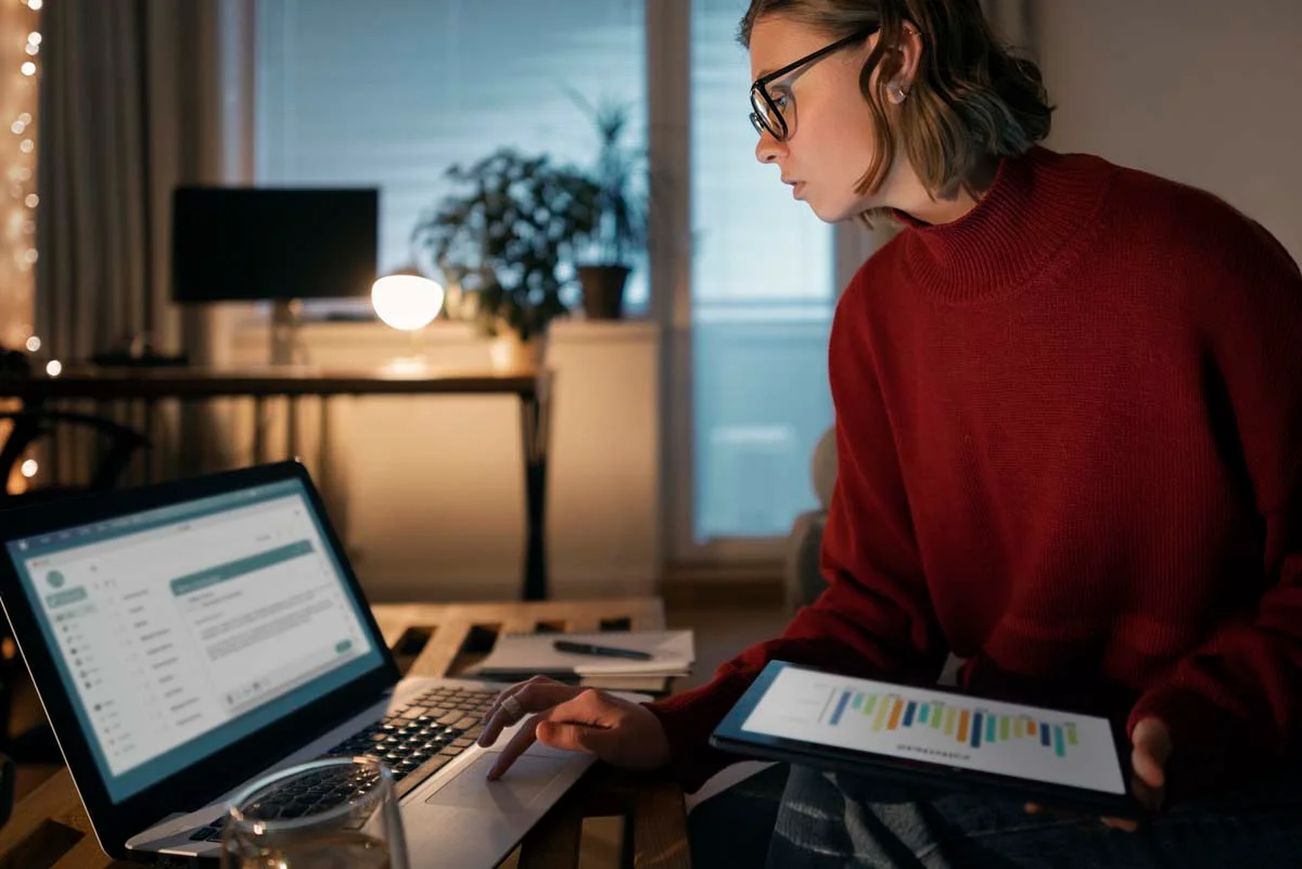 Property owner reviewing dynamic pricing charts and rental revenue performance on a laptop screen
