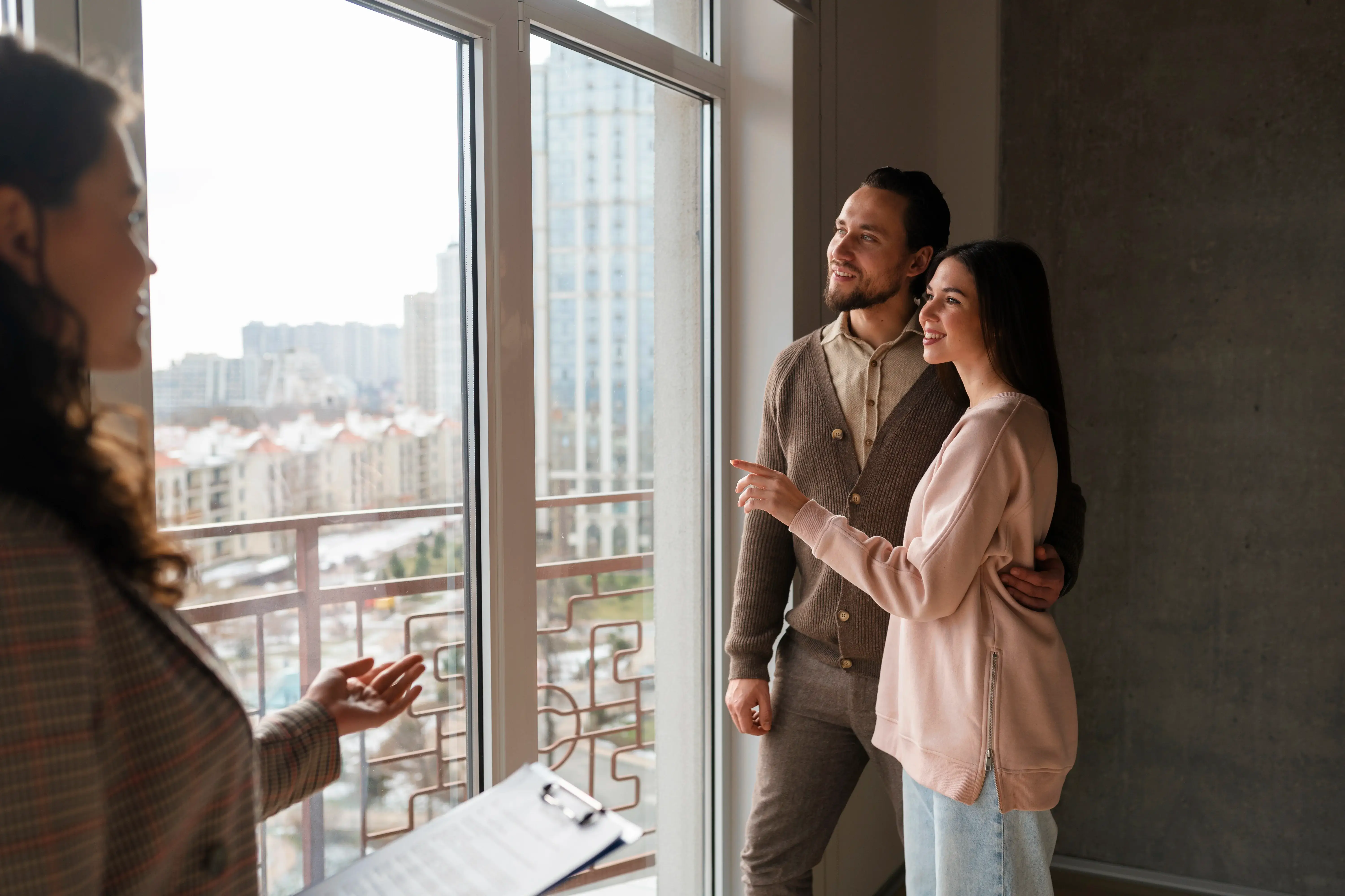 A homeowner and property manager discussing short-term rental management inside a Vaughan condo