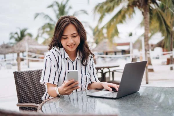 Property manager responding to guest inquiries on a smartphone