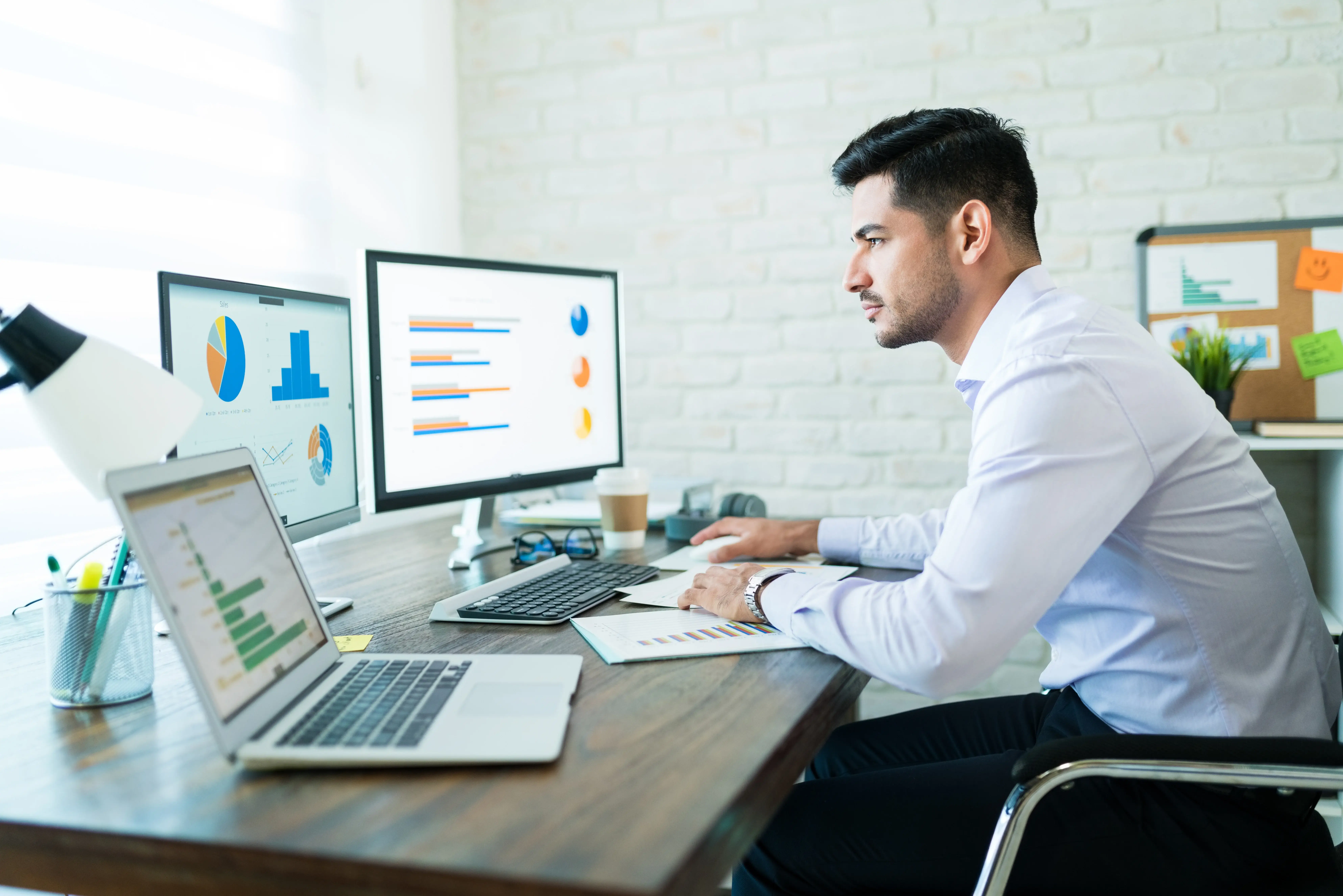 Property owner reviewing financial reports and mid-term rental data