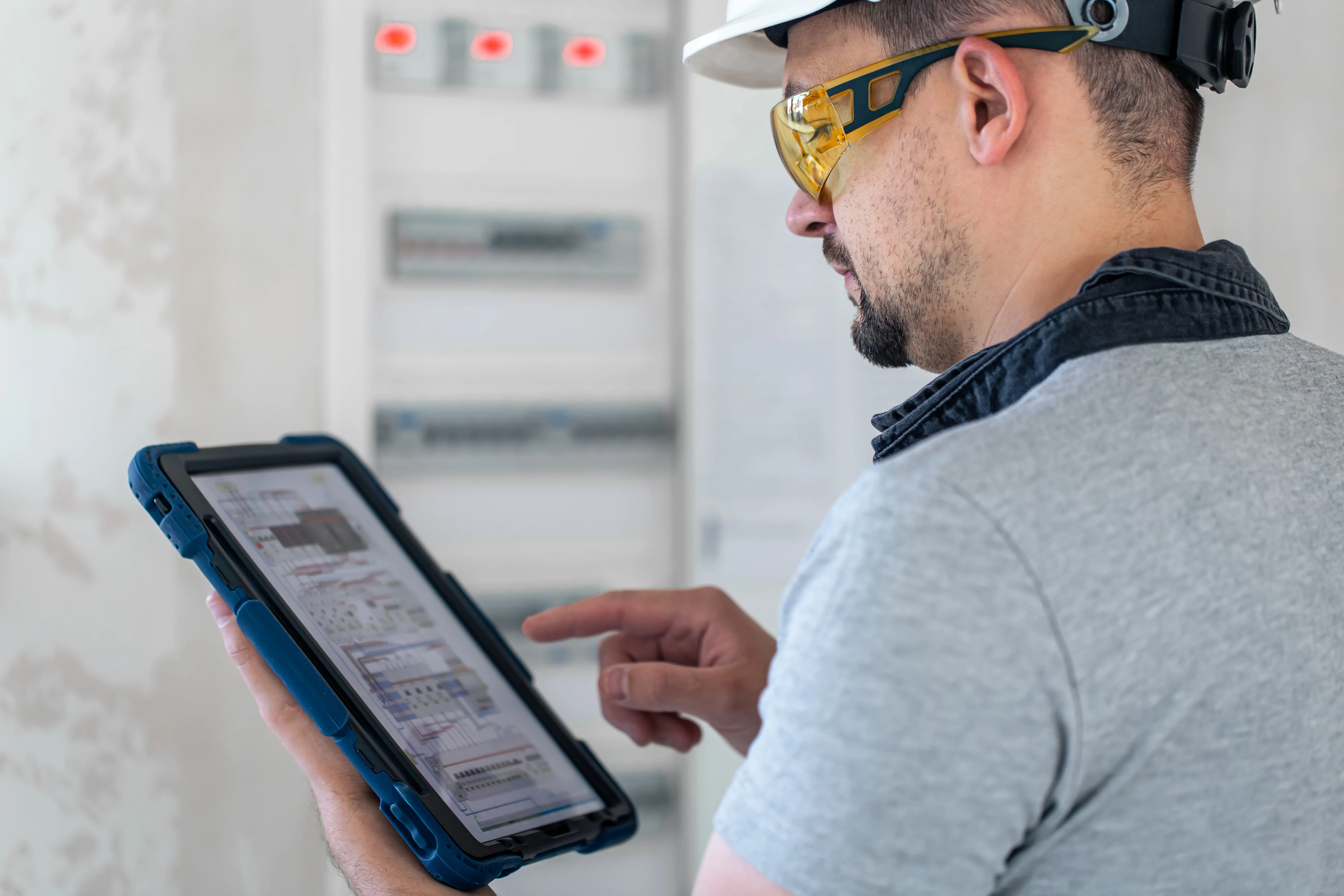 Technician handling maintenance coordination for smart home devices in a rental property'