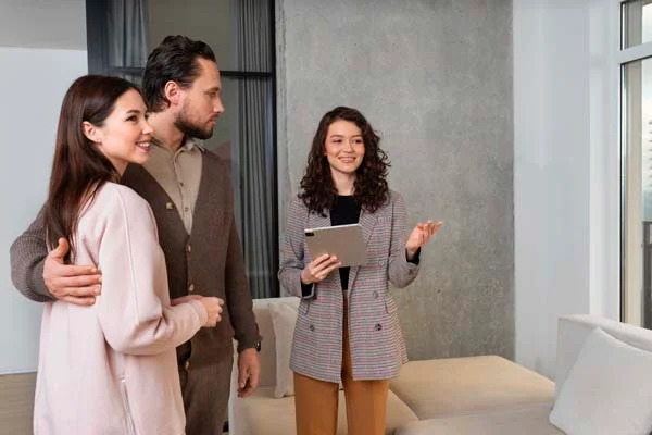 property management team member coordinating a guest check-in at an Airbnb Manhattan Beach rental
