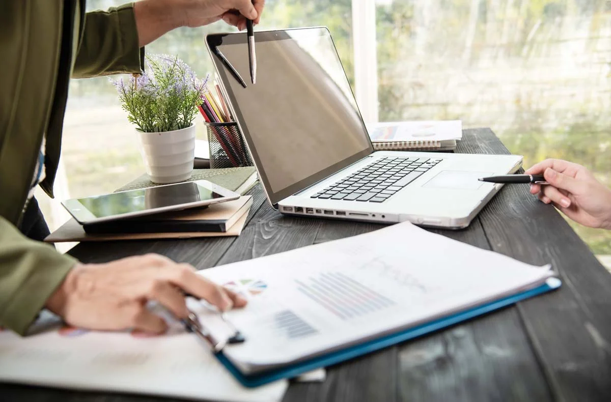 Checklist and documents on a desk for Local Law 18 guide