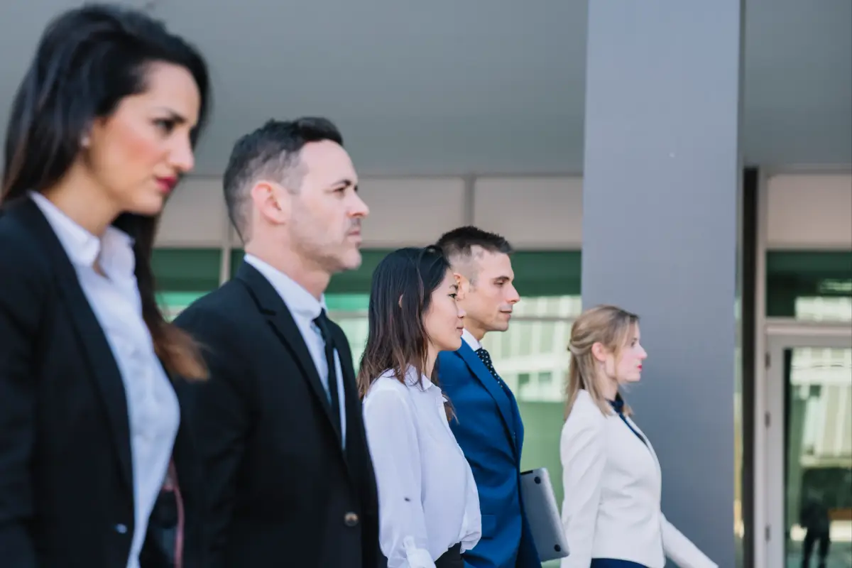Crowd of professional attendees at a corporate conference.