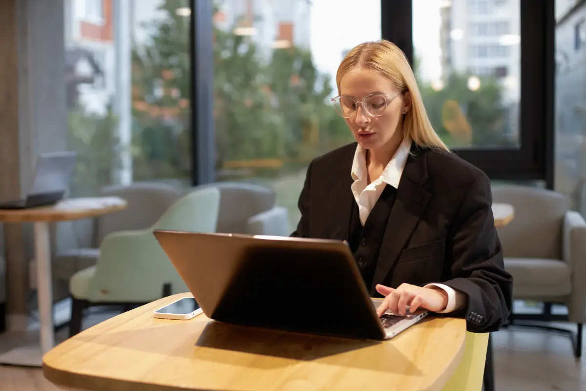 Remote professional working on a laptop in a furnished corporate rental